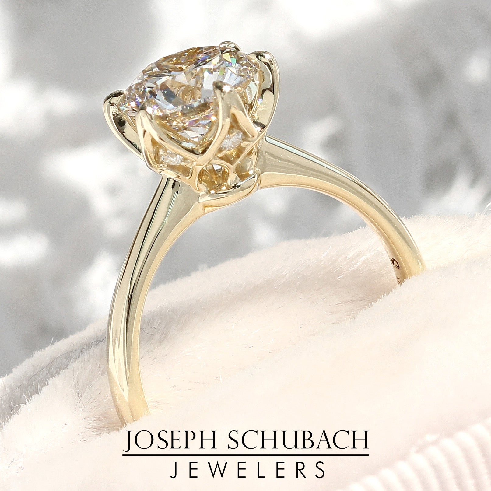 Style 102782: Round Cathedral Engagement Ring With A Six Prong Diamond Accent Crown Head