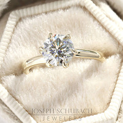 Style 103390: Rosebud Solitaire Engagement Ring with Diamond Petals and a Surprise Diamond Accent