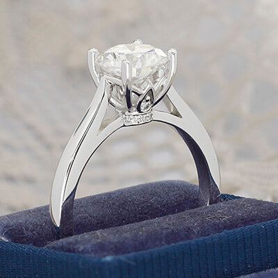 Style 103306: Cathedral Solitaire Engagement Ring With Diamond Leaf Basket