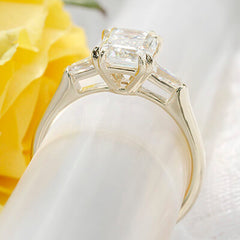 Style 103364: Manhattan Three Stone Emerald Cut Engagement Ring with Baguette Side Stones