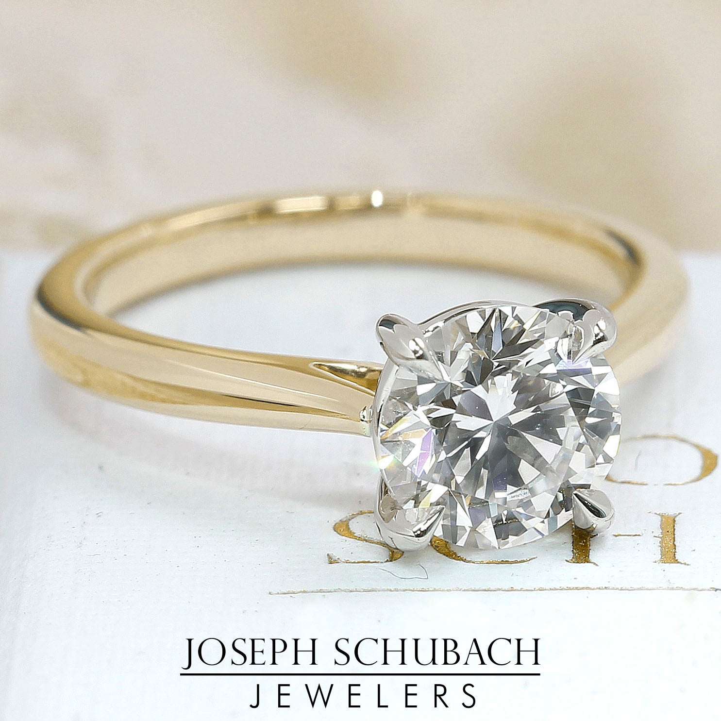 Style 103323-S: Classic Tapered Round Cathedral Solitaire Engagement Ring with Surprise Accent Diamond