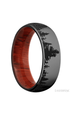 7 mm wide/Domed/Zirconium band with a laser carved Trees pattern also featuring a Padauk sleeve.