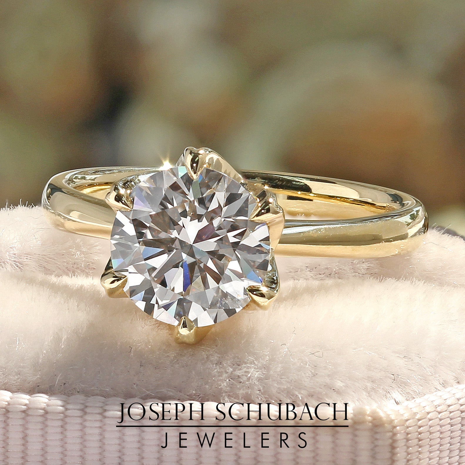 Style 102782: Round Cathedral Engagement Ring With A Six Prong Lab Diamond Accent Crown Head