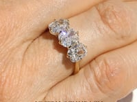 Style 104634: Cushion Diamond Three Stone Ring