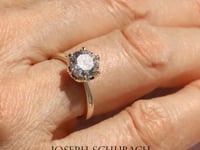 Style 102782: Round Cathedral Engagement Ring With A Six Prong Lab Diamond Accent Crown Head