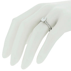 Style 102252: Radiant Shaped Engagement Ring With Round Diamond Side Stones