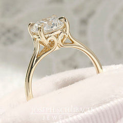 Style 102783: Round Scroll Solitaire Engagement Ring with a Surprise Diamond Accent