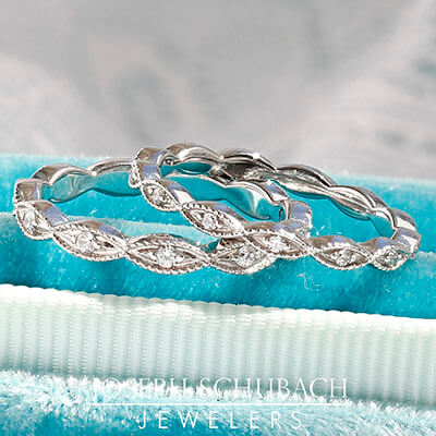 Style 103354: Marquise Shape Wedding Band With Single Round Diamonds And Migrained Edges