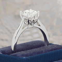 Style 103306: Cathedral Solitaire Engagement Ring With Diamond Leaf Basket