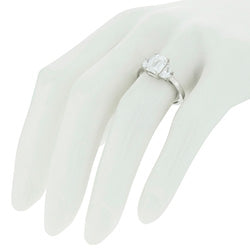 Style 102295: Three Stone Radiant Shaped Ring With Two Half Moon Diamonds