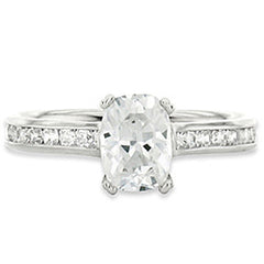 Style 102252: Radiant Shaped Engagement Ring With Round Diamond Side Stones