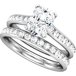 Style 102252: Radiant Shaped Engagement Ring With Round Diamond Side Stones