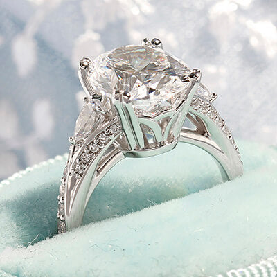 Style 103301: Oval, pear and round diamond engagement ring