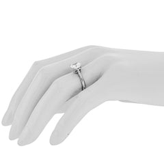 Style 102784: Low Profile Cushion Cathedral Engagement Ring With A Double Claw Prong Basket Head